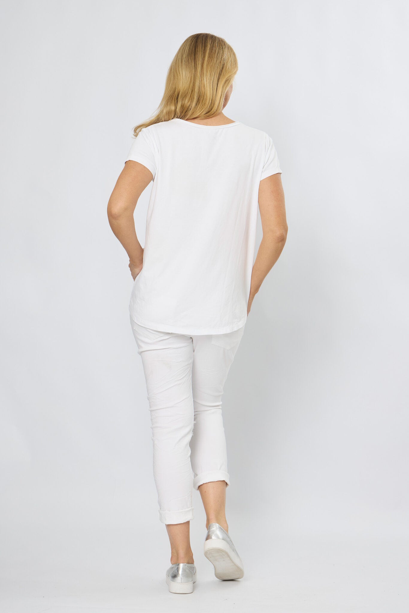 White cotton V-neck t-shirt with artistic flower motif - casual everyday wear