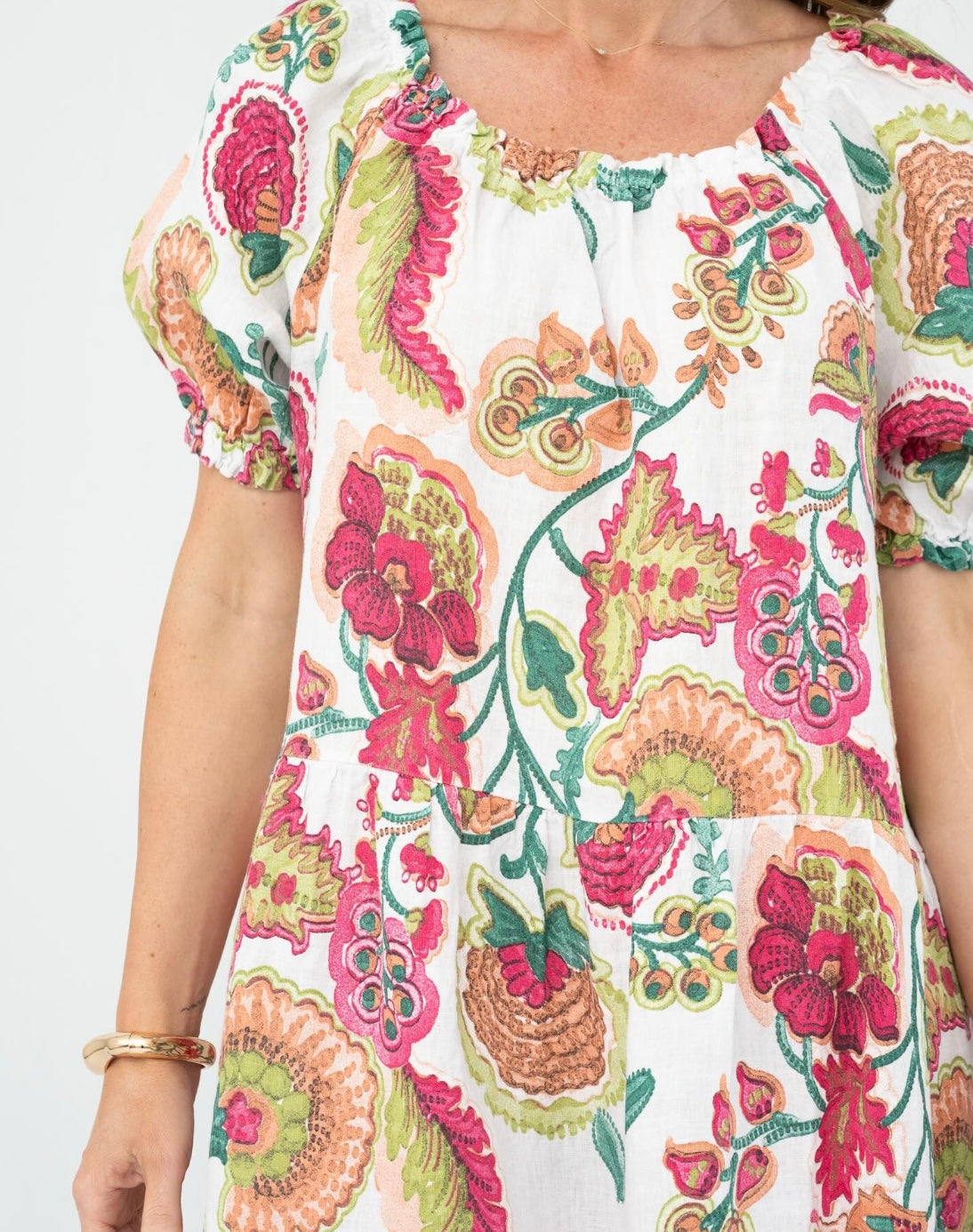 White and pink linen dress front view showing elastic neckline