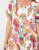 White and pink linen dress front view showing elastic neckline