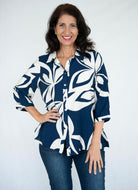 Navy and white floral shirt with collar and 3/4 adjustable sleeves