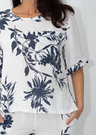 Navy floral linen outfit set showing relaxed fit top and pants
