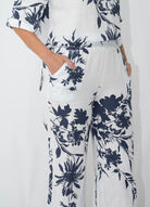 Navy floral linen outfit set showing relaxed fit top and pants