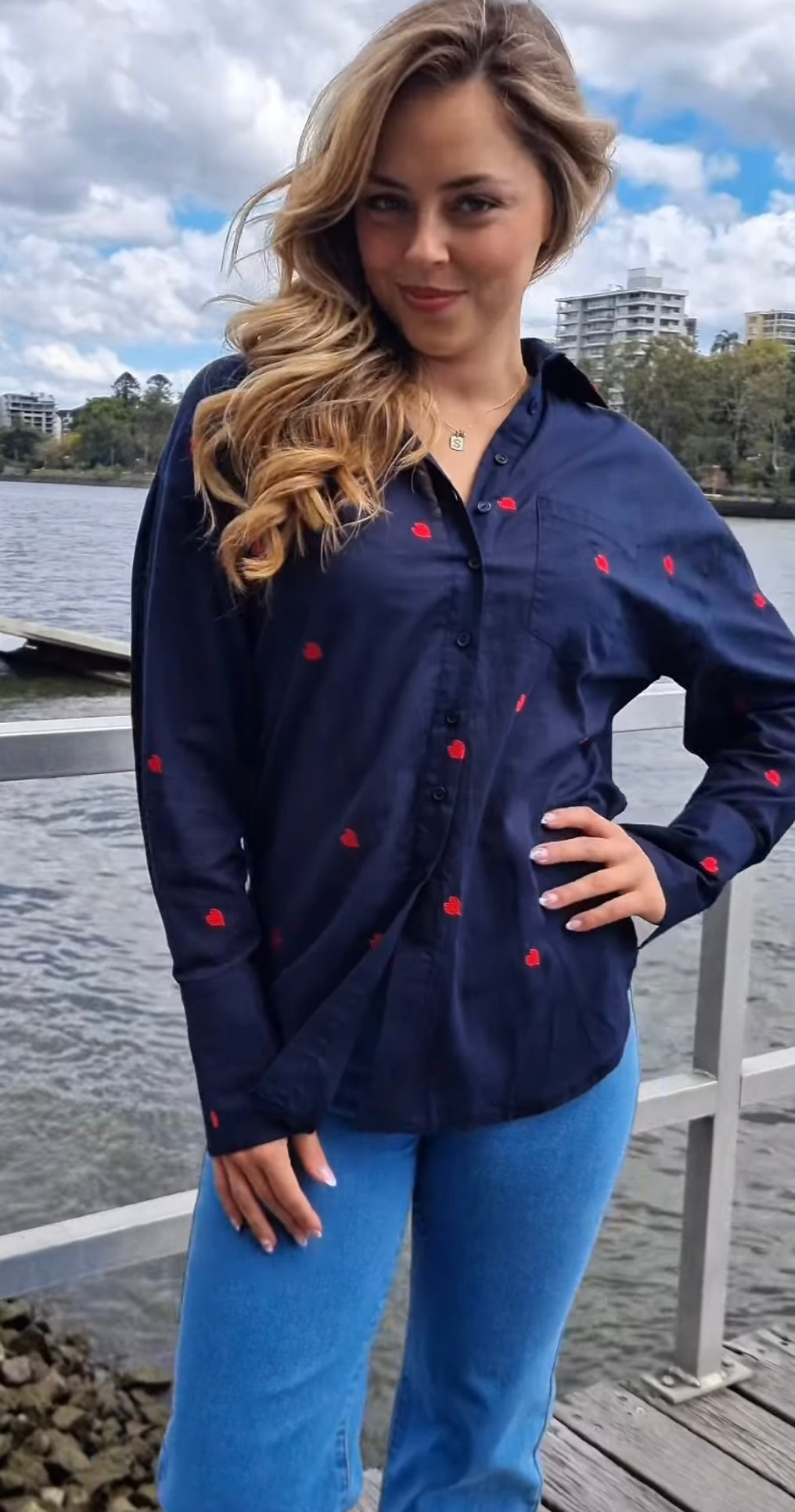 Navy shirt with embroidered red hearts and hi-lo hem
