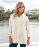 Lemon tan oversized cotton collared shirt with button-up front