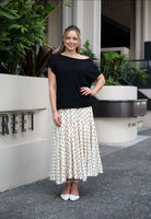 Black sleeveless knit vest in recycled crepe yarn with crew neck and ribbed details