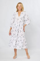 White cotton stitch print midi dress with 3/4 sleeves and tiered A-line skirt
