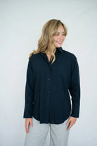 Navy collared shirt in lightweight viscose with full-length buttons